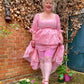 Woman wearing dragon fruit chub rub shorts