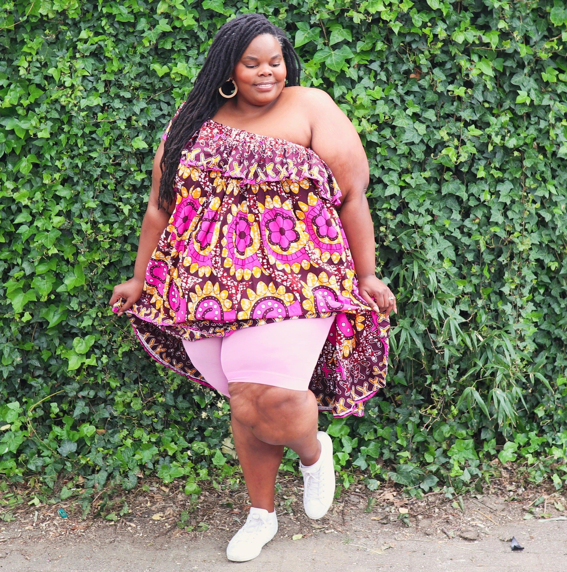 Woman wearing dragon fruit chub rub shorts