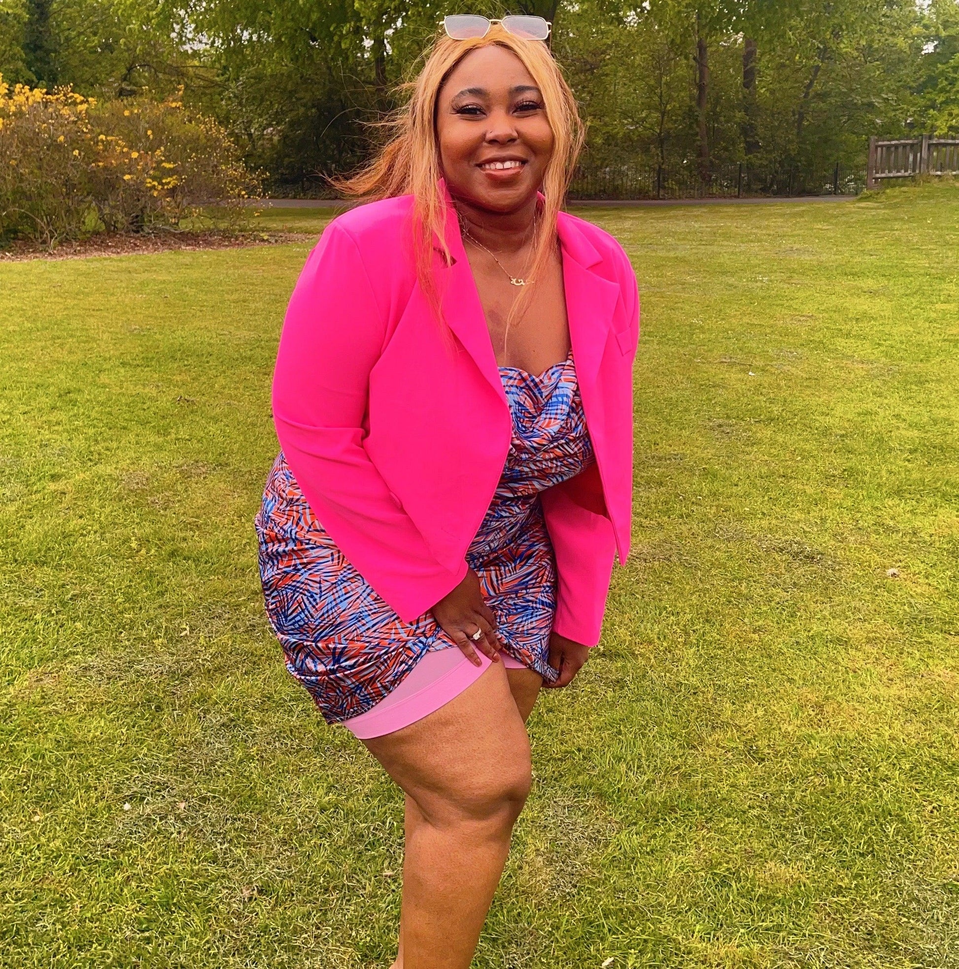 Woman wearing dragon fruit chub rub shorts