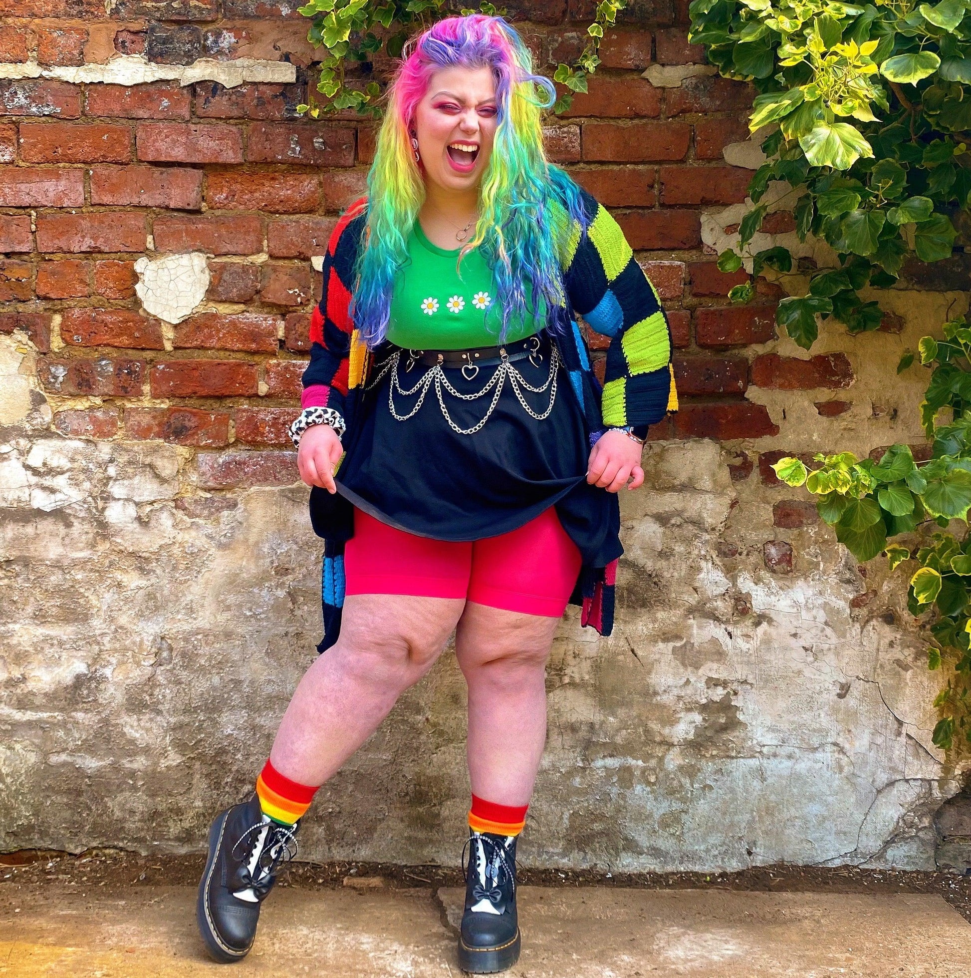 Woman wearing pomegranate chub rub shorts