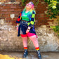 Woman wearing pomegranate chub rub shorts