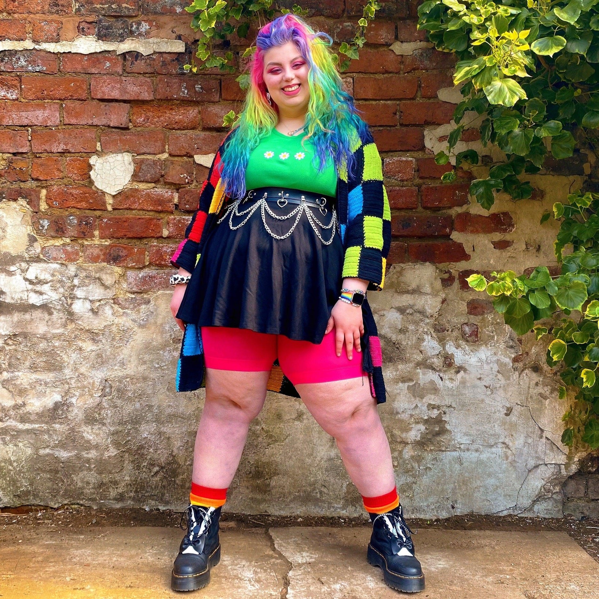 Woman wearing pomegranate chub rub shorts
