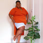 Woman wearing white chub rub shorts