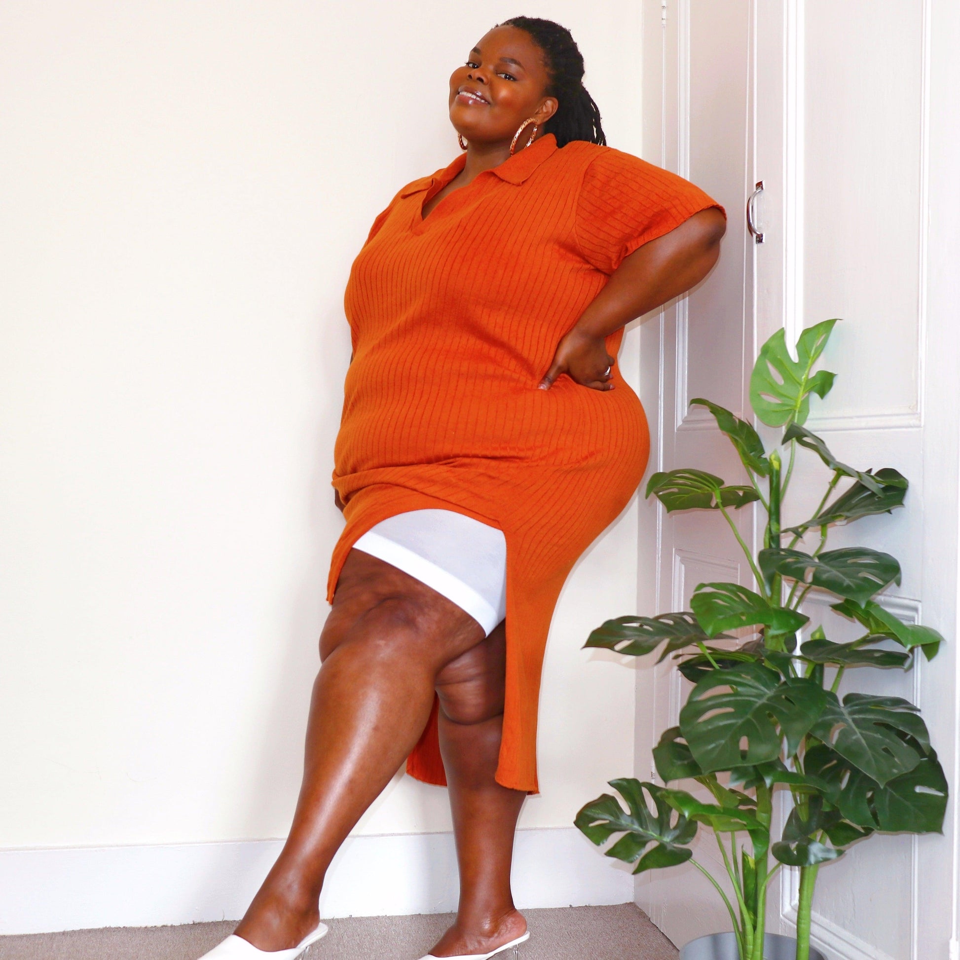 Woman wearing white chub rub shorts