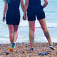Model wearing rainbow coloured fishnets